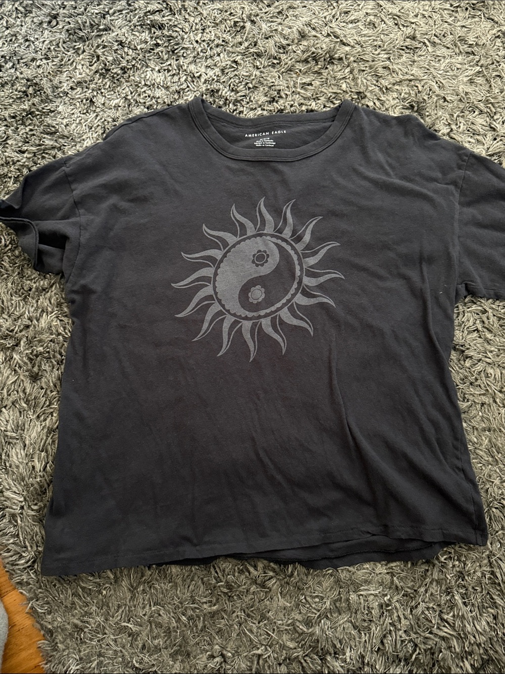 American Eagle Outfitters Women’s Black Graphic Tee with Yin-Yang Sun